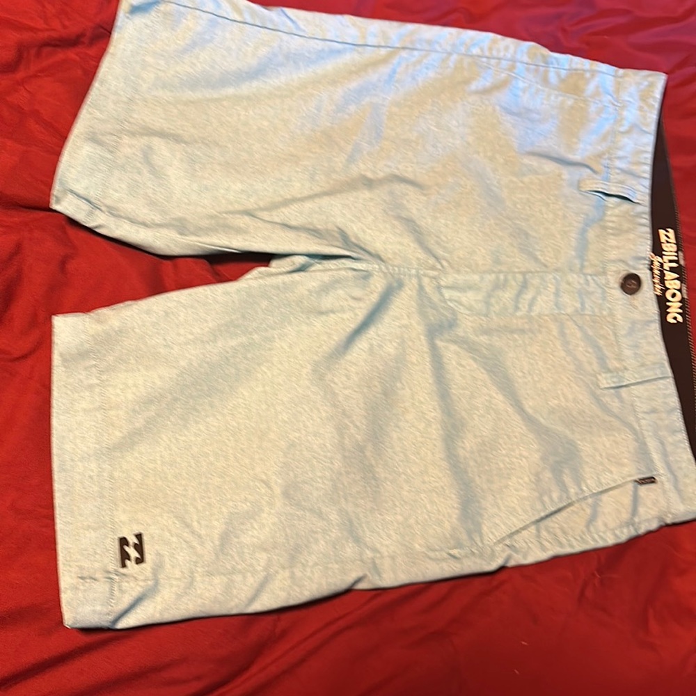 Teal Billabong submersibles crossfire shorts. Can be used for swimming. Size 32